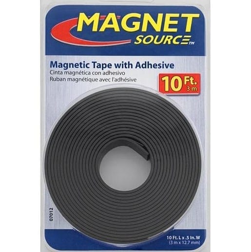 wall-mounted magnetic strip holding tools