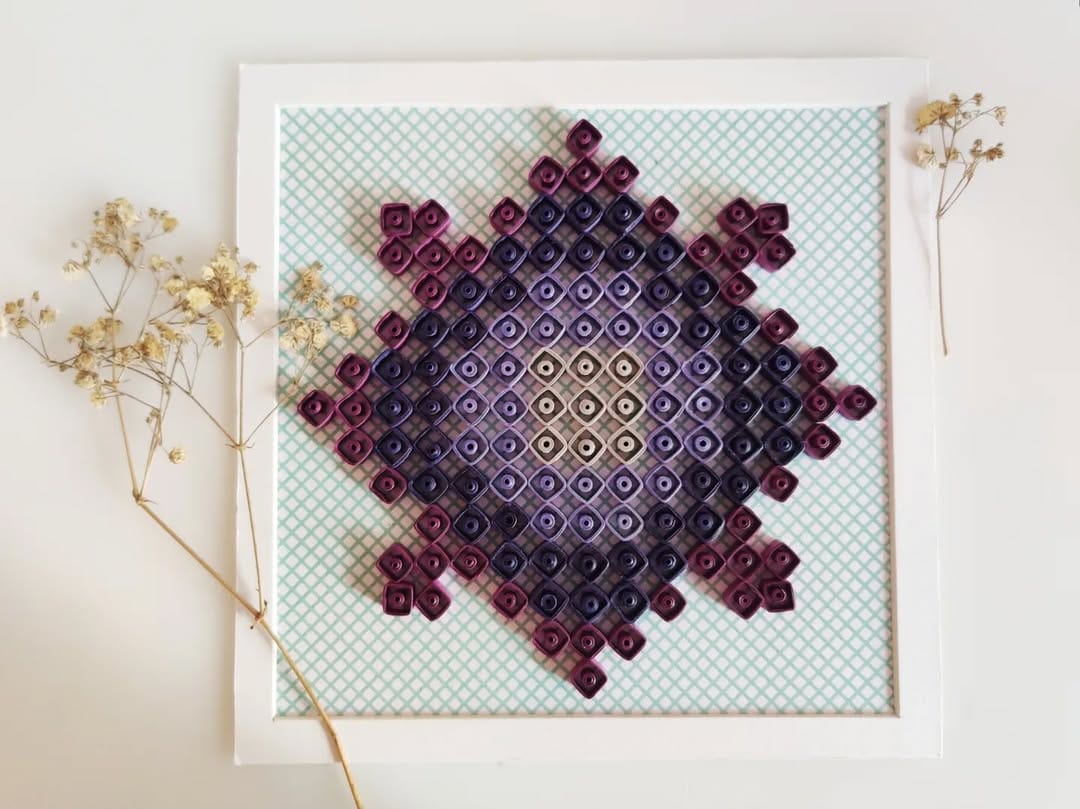 intricate quilled paper art pattern