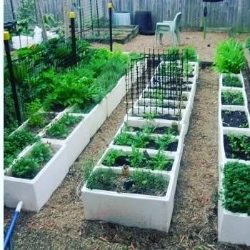 Cinder block self-watering planter