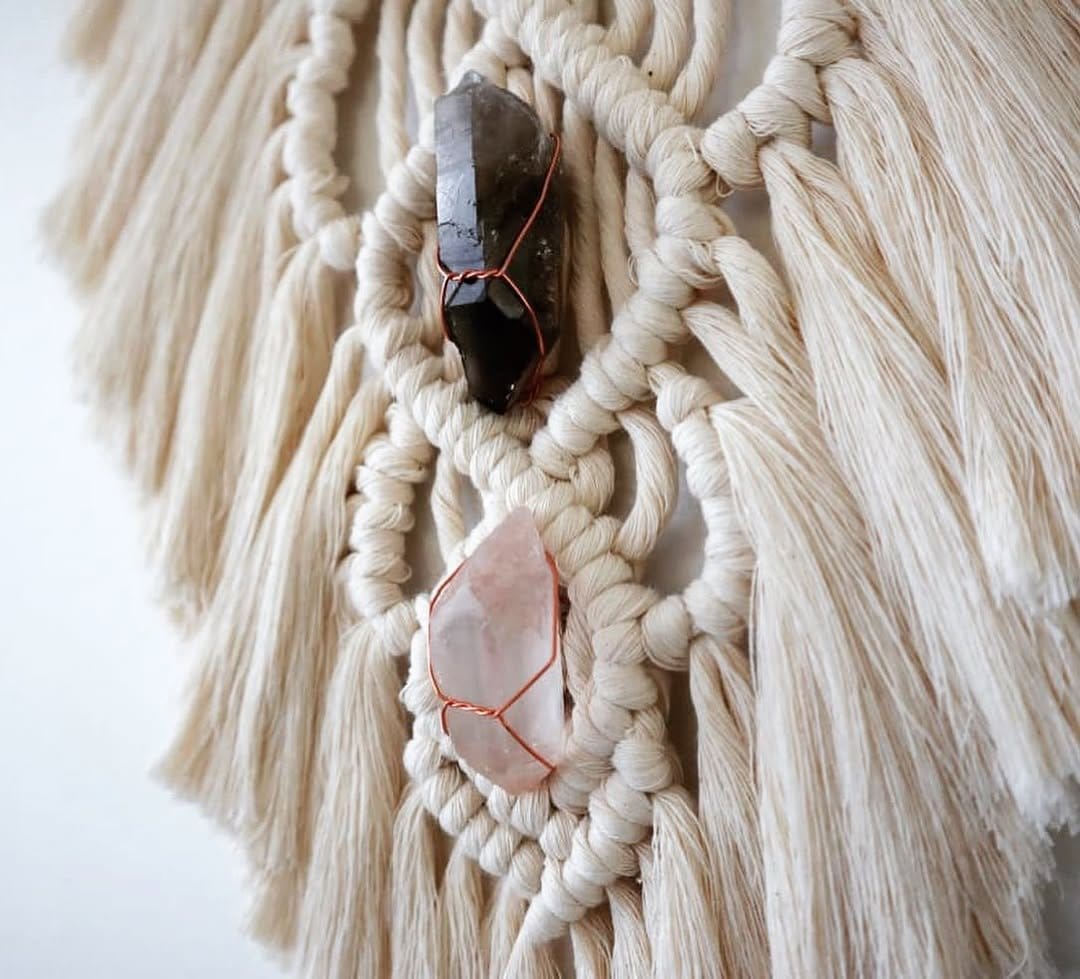 Earthy feather and bead wall hanging