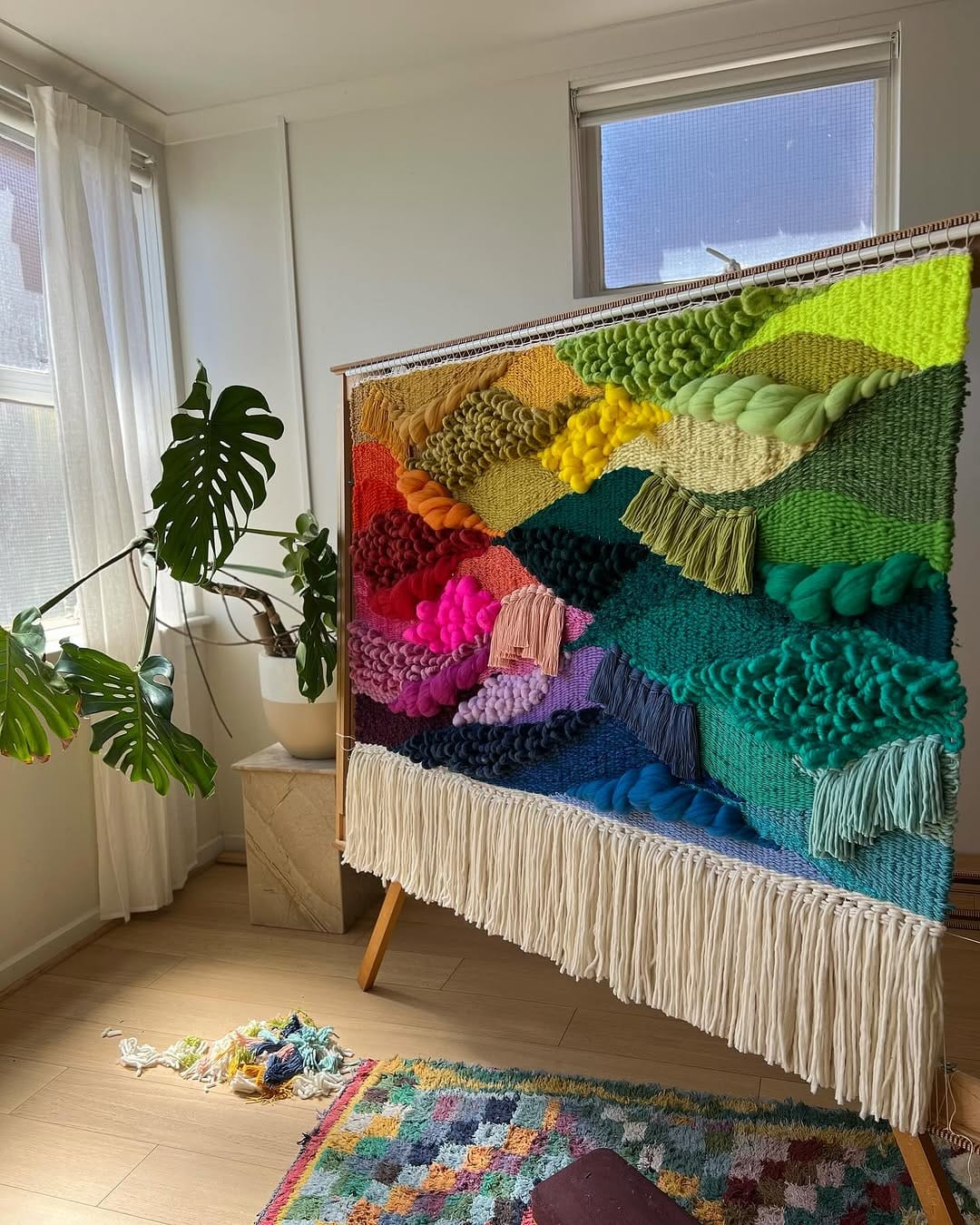 colorful fabric tapestry on bedroom wall