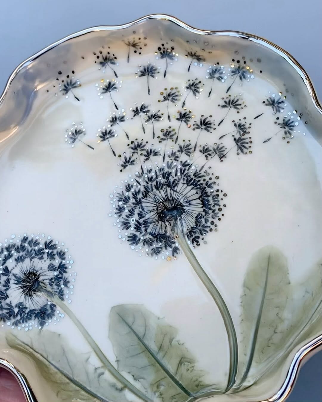 hand-molded clay trinket dishes with gold accents