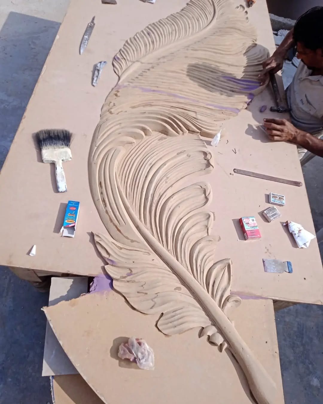 Monochromatic plaster wall art display