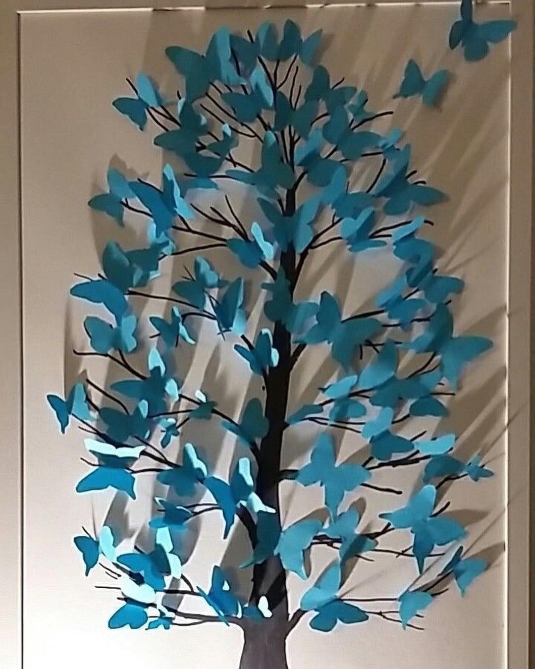 delicate paper butterflies on wall