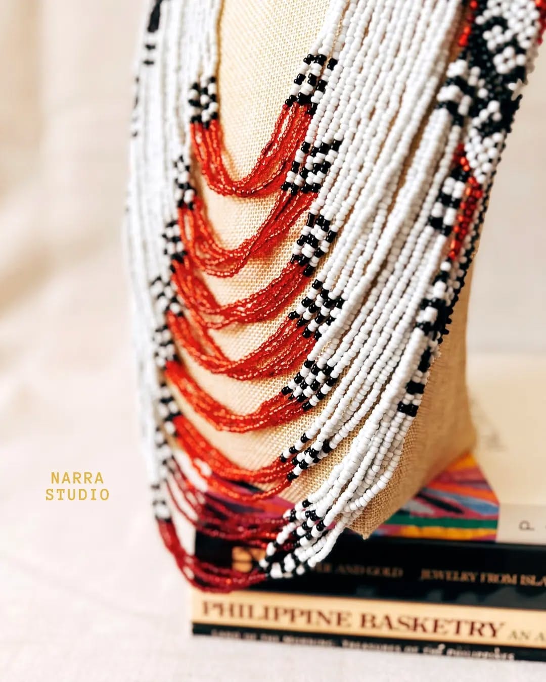 artisan crafting personalized necklaces with beads