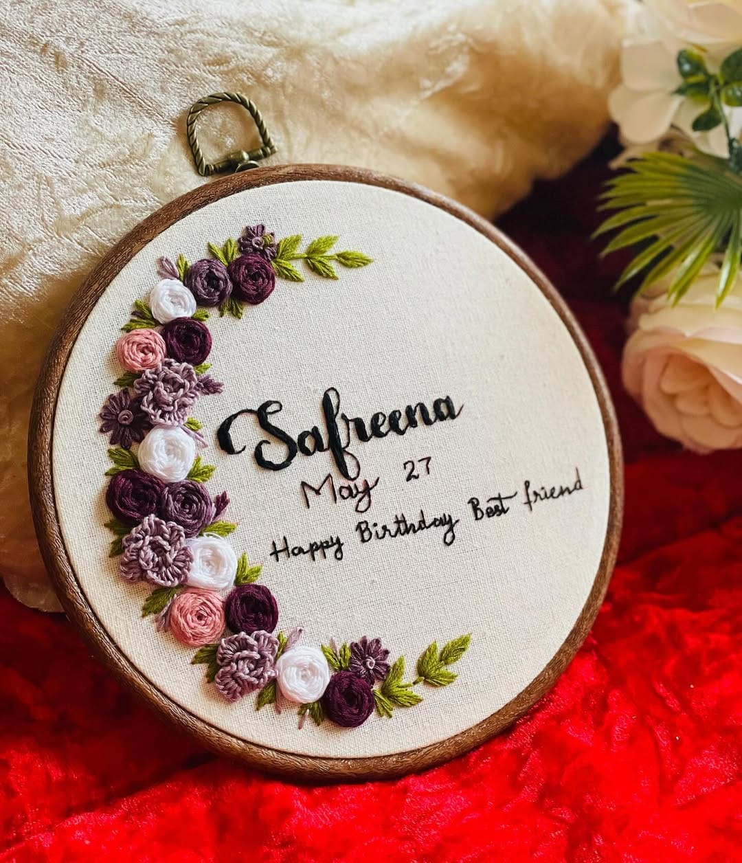 collection of embroidered hoops with floral designs