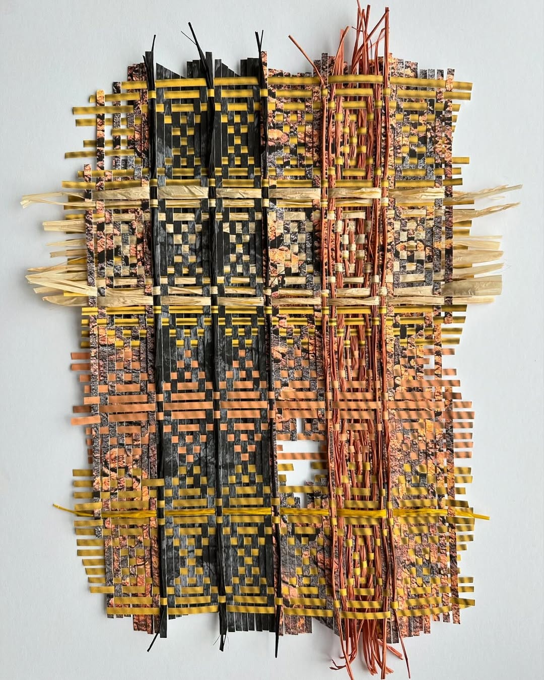 intricate paper strip wall weave