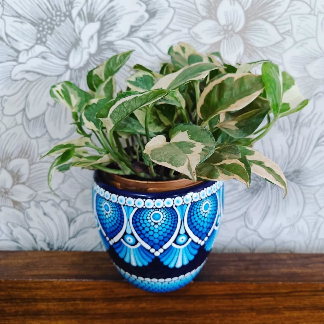 Bright handmade painted flower pot