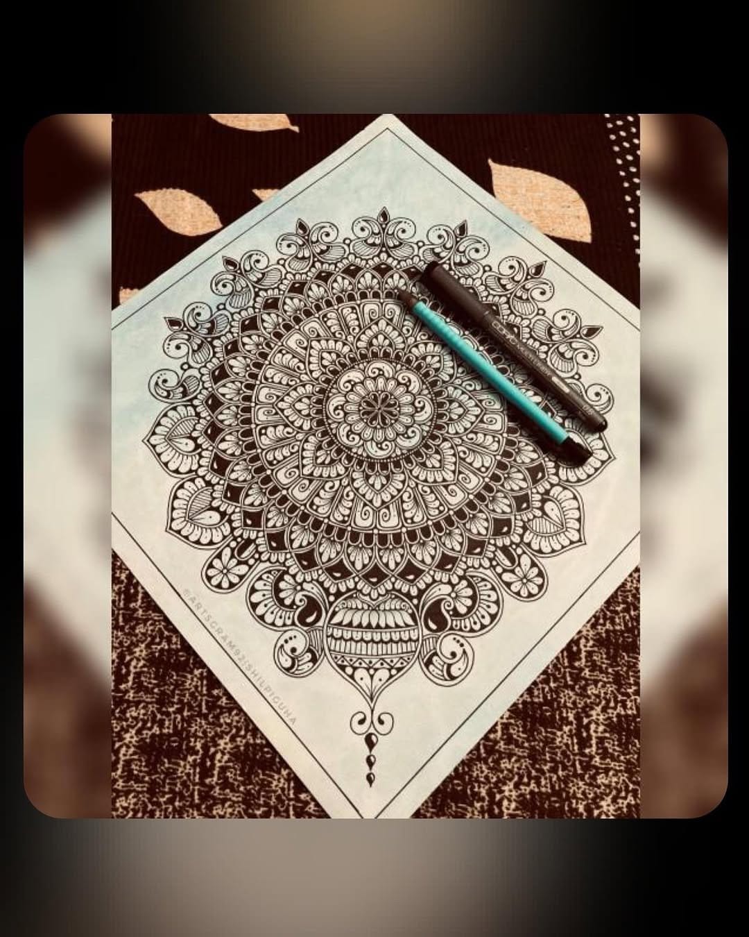 Intricate colorful handmade mandala art