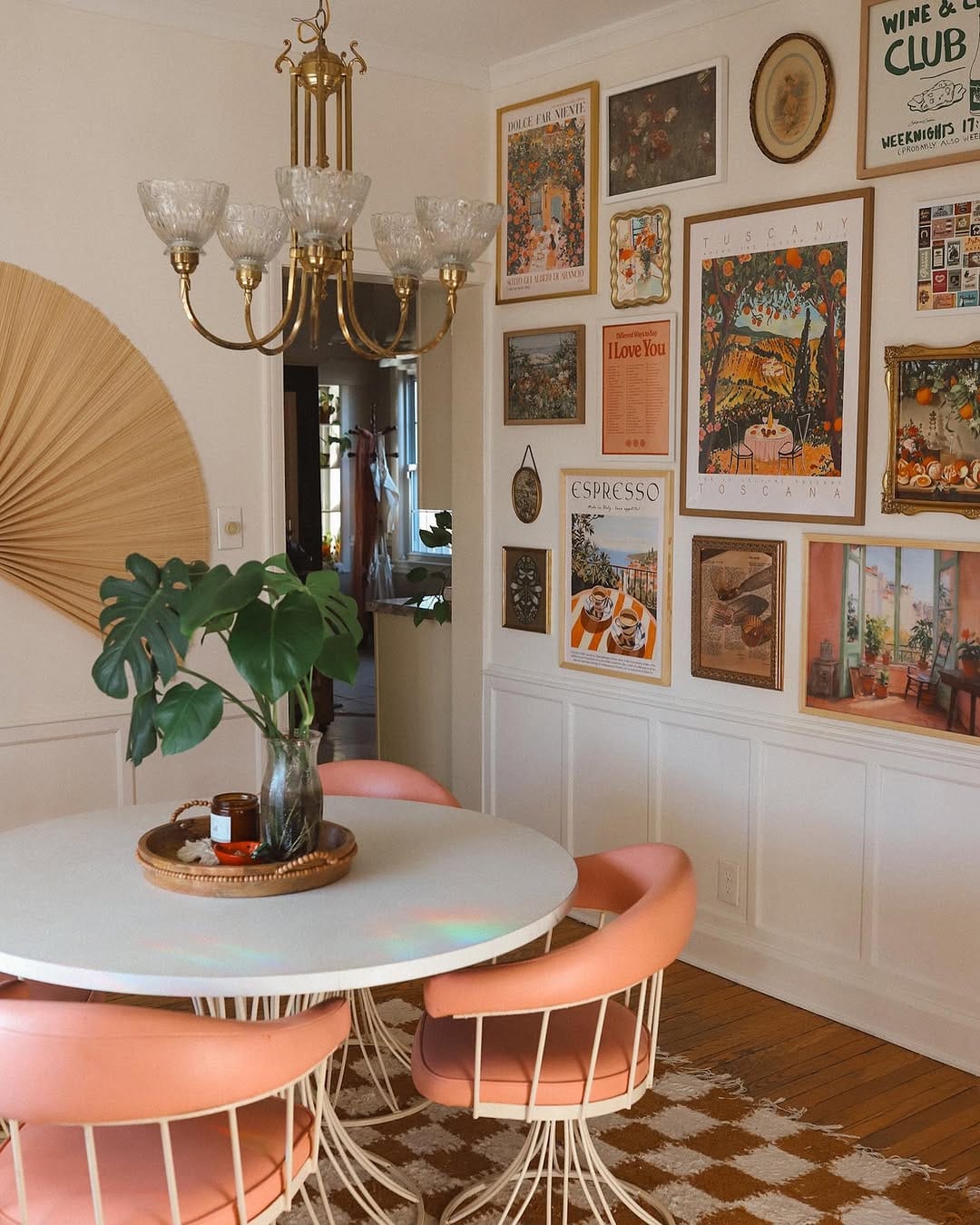 living room gallery wall with varied artwork