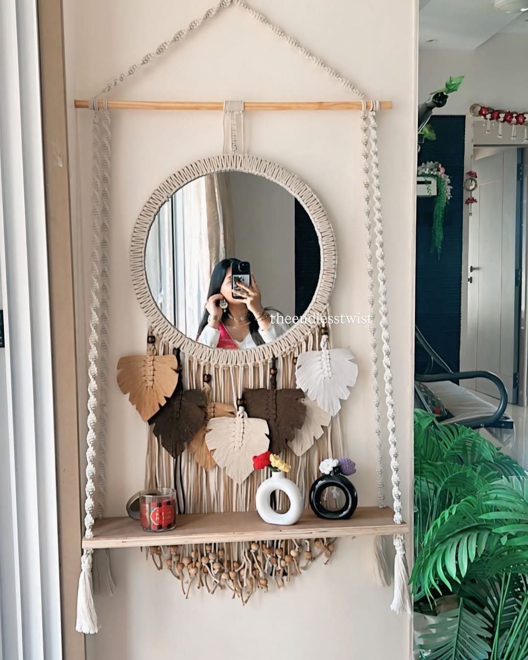 Stylish mirror and macramé wall hanging