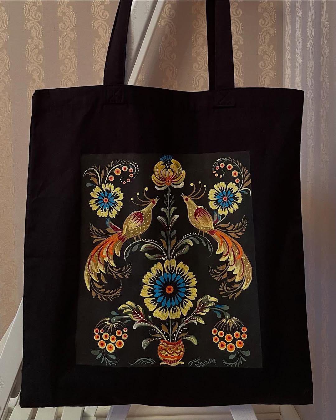 hand-painted tote bag with floral design