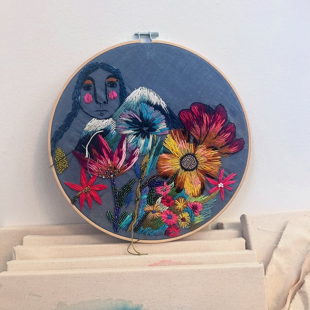 Wall with embroidered hoop art collection