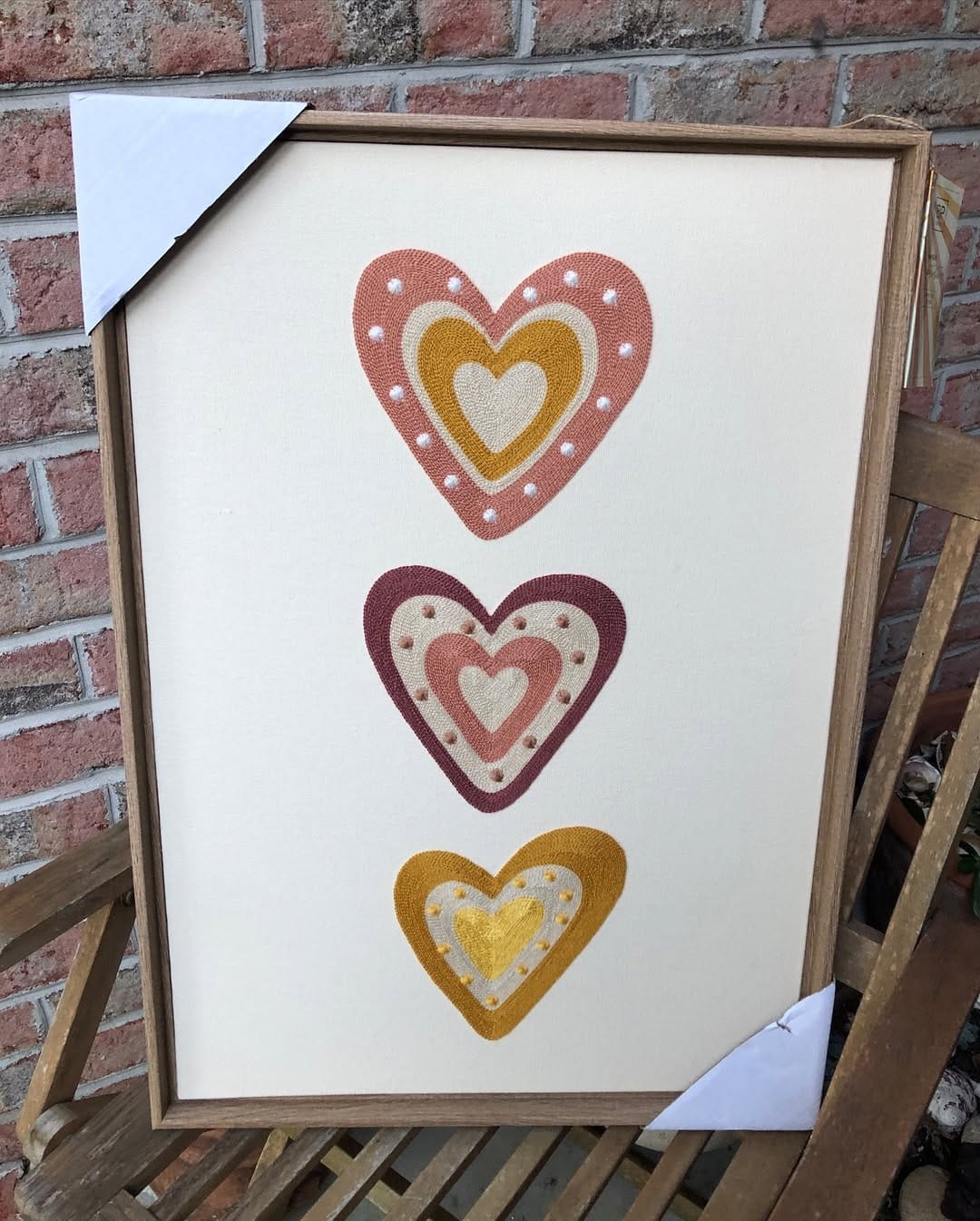colorful button canvas art with heart shape