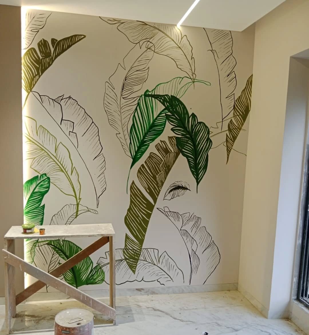 Lush green hand-painted leaf mural