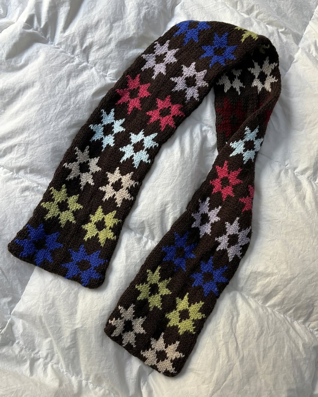 knitting cozy scarf with wool