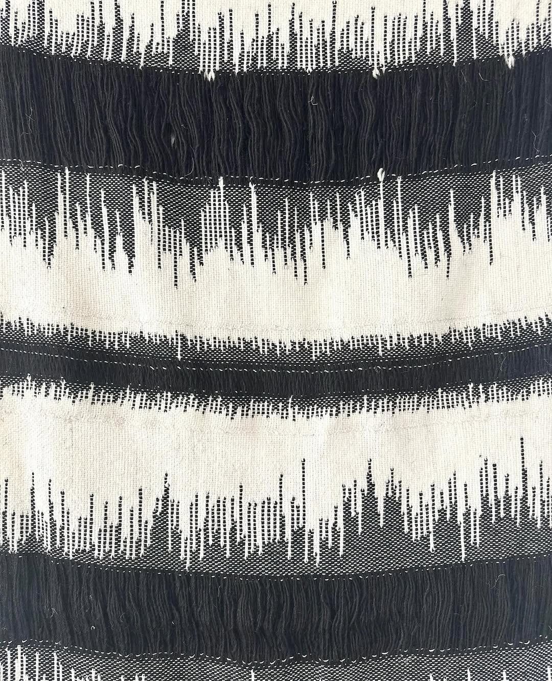 Soft gray handmade woven tapestry