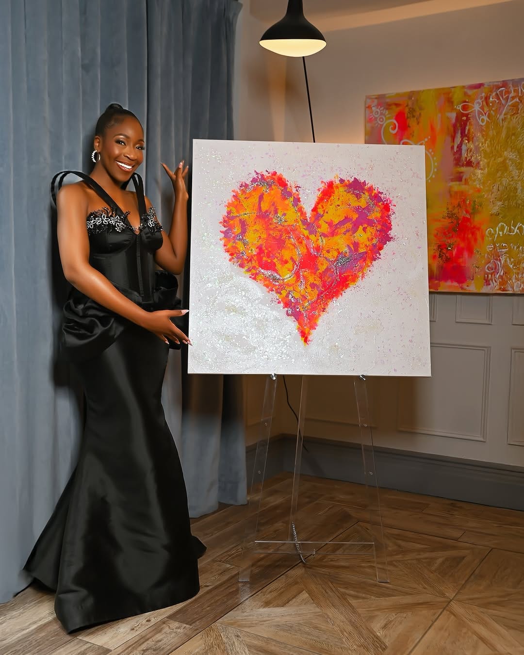 painted canvas art with abstract heart design