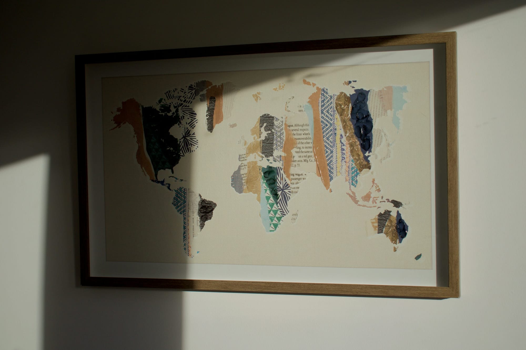 scratch-off world map on a wall