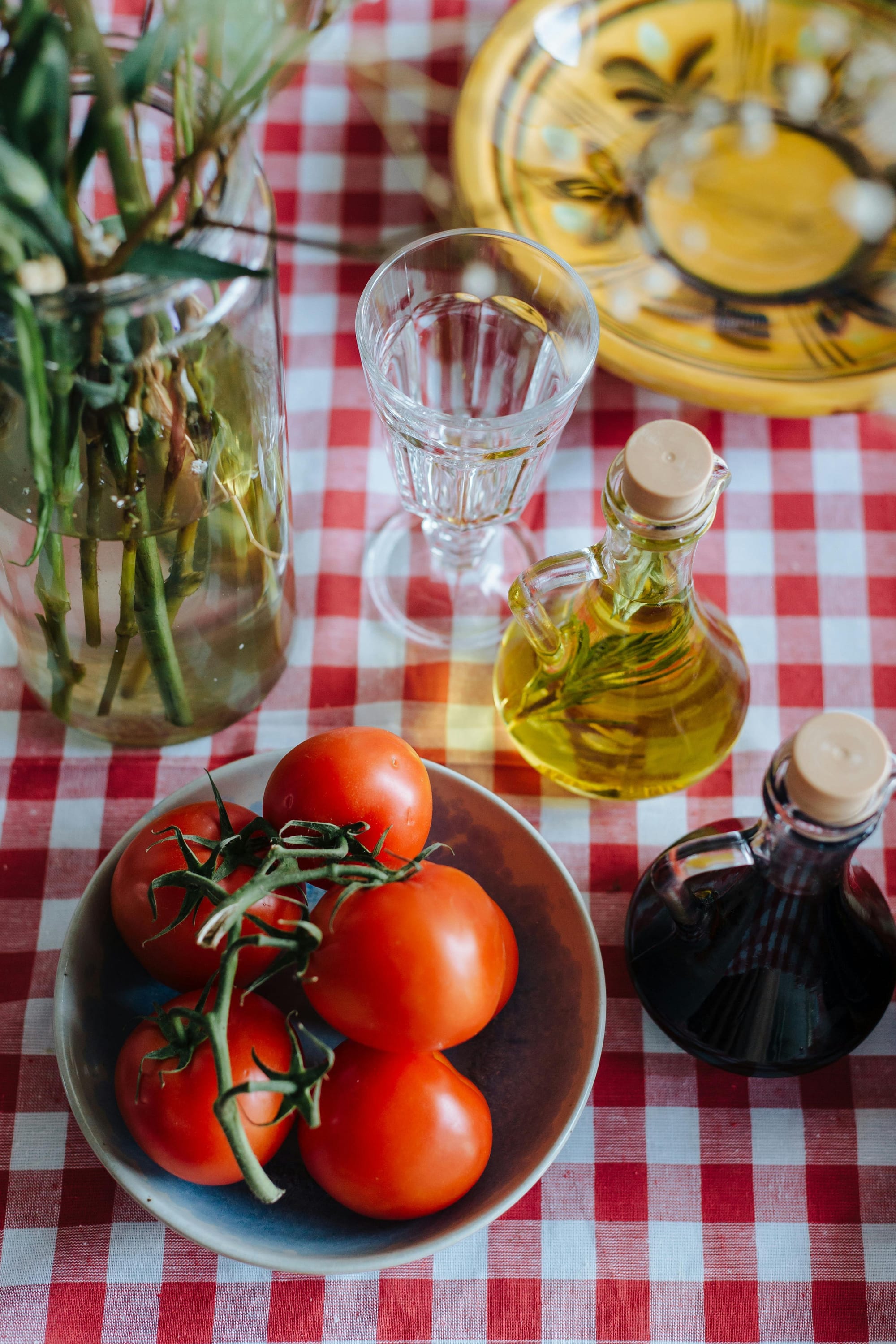 Tomato plant with bottle irrigation