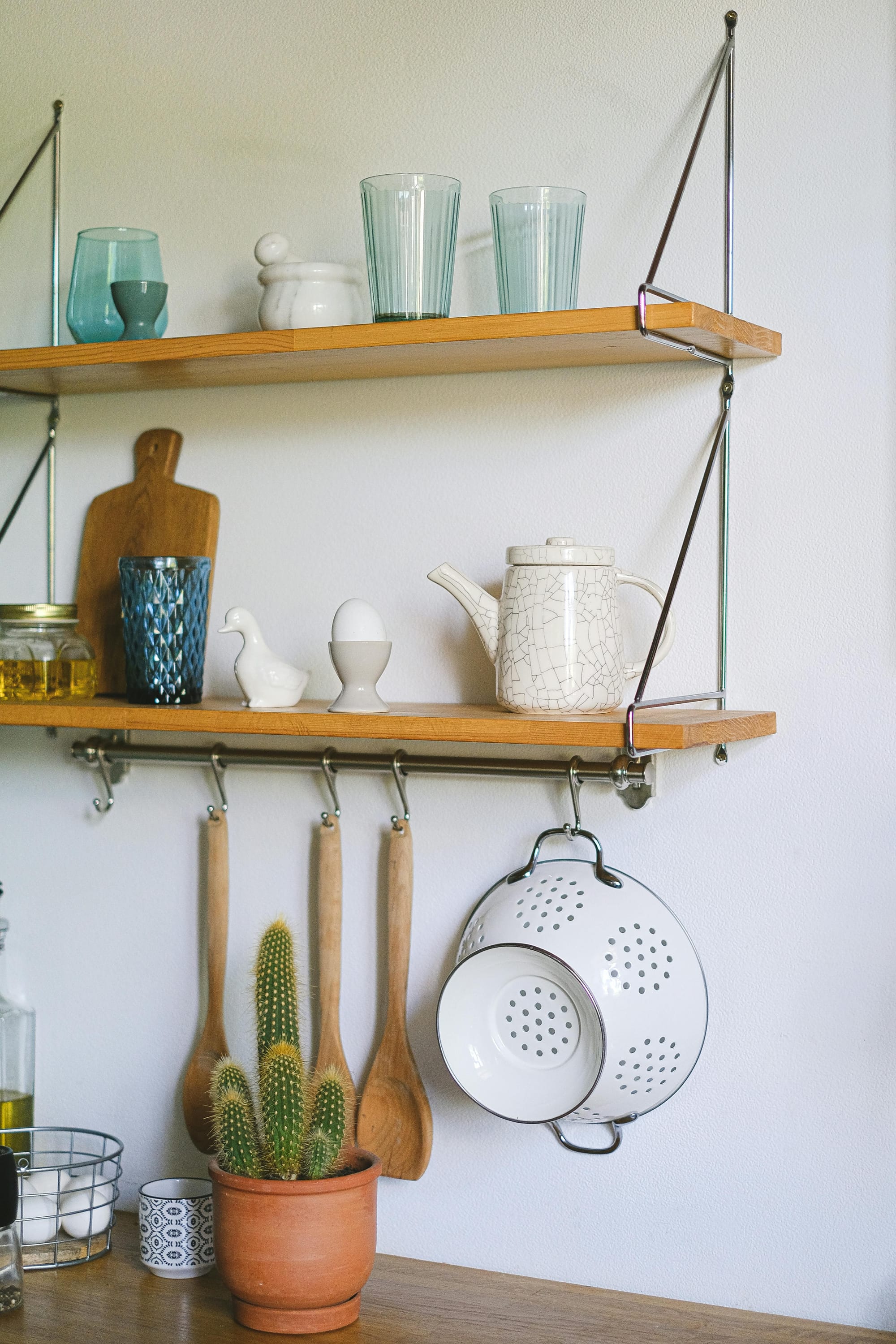 Colander self-watering planter