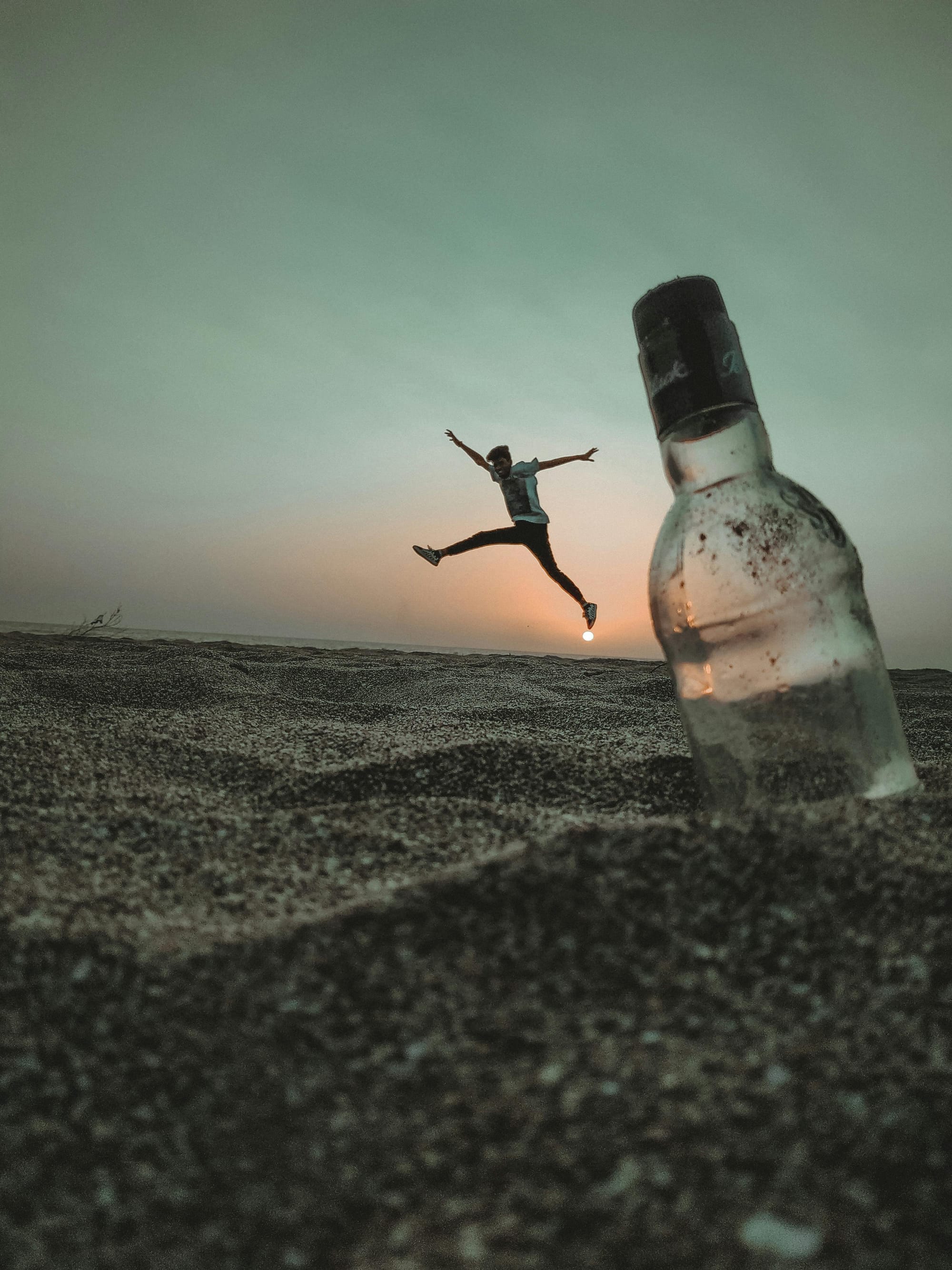 Perforated bottle in soil
